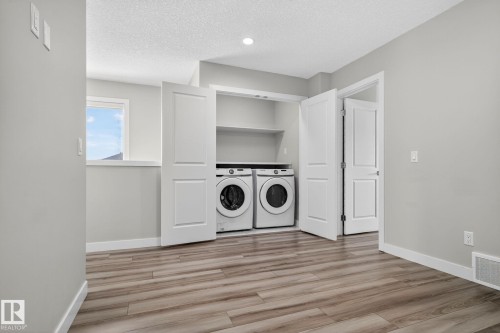 4883 Alwood Point(E), Edmonton, AB - Indoor Photo Showing Laundry Room