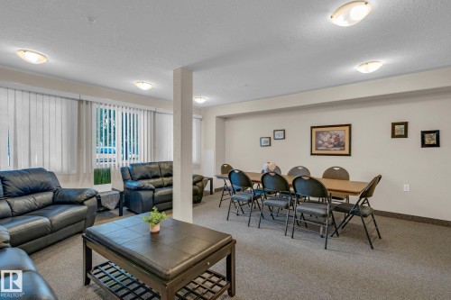 212 12550 140 Avenue, Edmonton, AB - Indoor Photo Showing Living Room