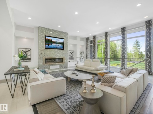 26 51222 Rge Road 260, Rural Parkland County, AB - Indoor Photo Showing Living Room With Fireplace