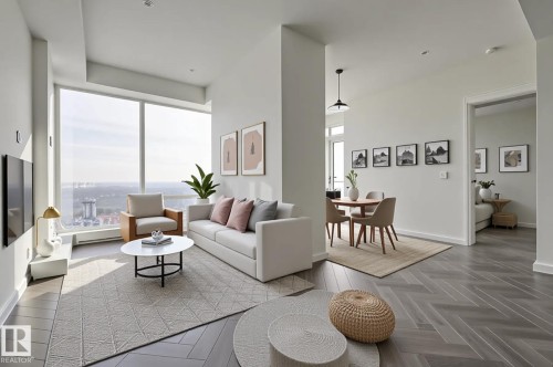 Living area featuring baseboards and parquet flooring - 4503 10360 102 Nw, Edmonton, AB - Indoor Photo Showing Living Room