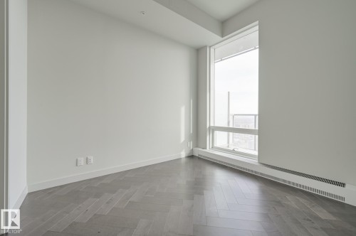 Unfurnished room featuring plenty of natural light - 4503 10360 102 Nw, Edmonton, AB - Indoor Photo Showing Other Room