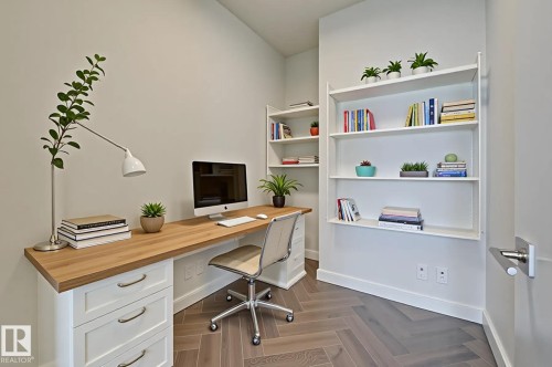 Office featuring baseboards - 4503 10360 102 Nw, Edmonton, AB - Indoor Photo Showing Office