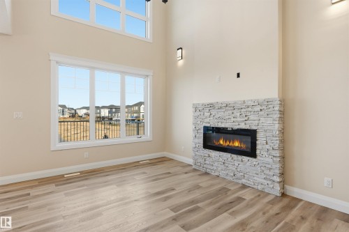 19034 20A Ave, Edmonton, AB - Indoor Photo Showing Living Room With Fireplace
