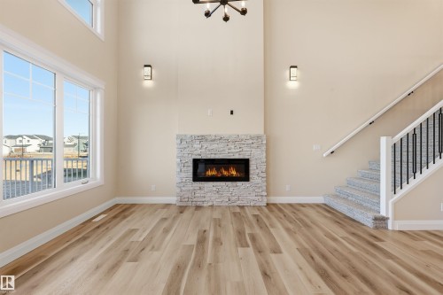 19034 20A Ave, Edmonton, AB - Indoor Photo Showing Living Room With Fireplace
