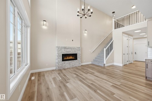 19034 20A Ave, Edmonton, AB - Indoor Photo Showing Other Room With Fireplace