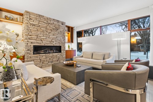 9739 145 Street, Edmonton, AB - Indoor Photo Showing Living Room With Fireplace