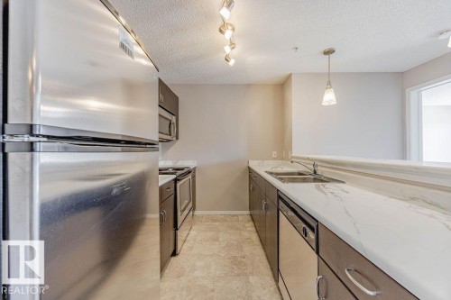Edmonton, AB - Indoor Photo Showing Kitchen With Stainless Steel Kitchen With Double Sink With Upgraded Kitchen