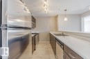 Edmonton, AB  - Indoor Photo Showing Kitchen With Stainless Steel Kitchen With Double Sink With Upgraded Kitchen 