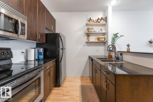 3 9856 83 Avenue, Edmonton, AB - Indoor Photo Showing Kitchen With Double Sink
