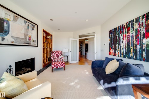 28 Riverside Crescent, Edmonton, AB - Indoor Photo Showing Other Room With Fireplace