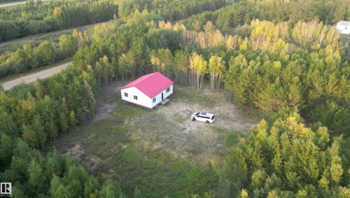 View of subject property featuring a forest - 4011 50 Avenue, Rural Westlock County, AB 