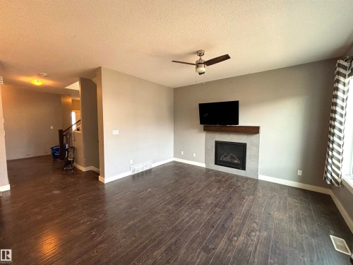 17615 77 Street, Edmonton, AB - Indoor Photo Showing Living Room With Fireplace