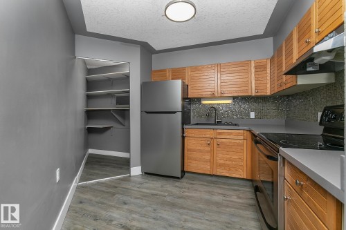 1910 10149 Saskatchewan Drive, Edmonton, AB - Indoor Photo Showing Kitchen