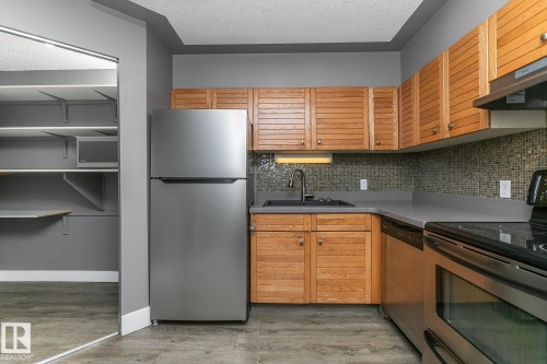 1910 10149 Saskatchewan Drive, Edmonton, AB - Indoor Photo Showing Kitchen