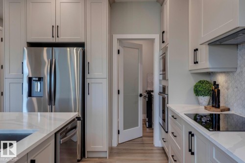 3612 Triomphe Boulevard, Beaumont, AB - Indoor Photo Showing Kitchen With Stainless Steel Kitchen With Upgraded Kitchen