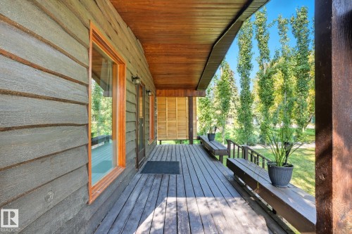 View of wooden terrace - 6309 49 St, Rural Wetaskiwin County, AB - Outdoor With Deck Patio Veranda With Exterior