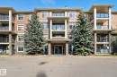 209 11615 Ellerslie Road, Edmonton, AB  - Outdoor With Balcony With Facade 