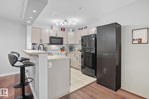 209 11615 Ellerslie Road, Edmonton, AB - Indoor Photo Showing Kitchen