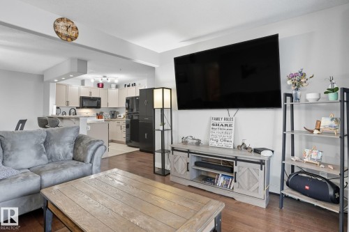 209 11615 Ellerslie Road, Edmonton, AB - Indoor Photo Showing Living Room