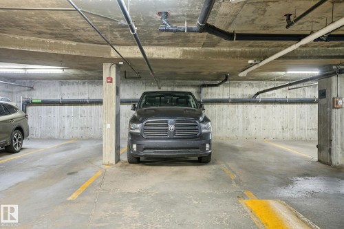 209 11615 Ellerslie Road, Edmonton, AB - Indoor Photo Showing Garage