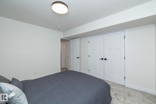 56 Brazeau Drive, Devon, AB - Indoor Photo Showing Bedroom