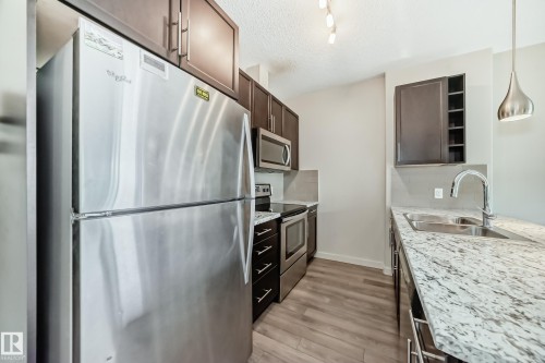 327 508 Griesbach Parade, Edmonton, AB - Indoor Photo Showing Kitchen With Double Sink With Upgraded Kitchen