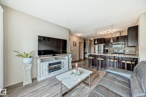 327 508 Griesbach Parade, Edmonton, AB - Indoor Photo Showing Living Room
