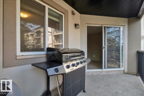 View of patio with a grill - 226 13111 140 Avenue, Edmonton, AB - Outdoor With Deck Patio Veranda With Exterior