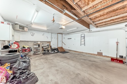 56 Bonin Crescent, Beaumont, AB - Indoor Photo Showing Garage