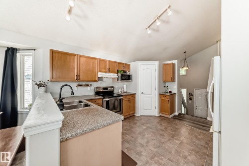 56 Bonin Crescent, Beaumont, AB - Indoor Photo Showing Kitchen With Double Sink