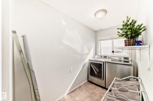 56 Bonin Crescent, Beaumont, AB - Indoor Photo Showing Laundry Room