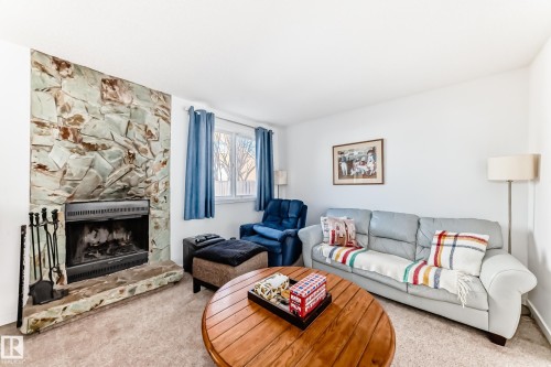 18611 66 Avenue, Edmonton, AB - Indoor Photo Showing Living Room With Fireplace