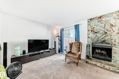18611 66 Avenue, Edmonton, AB - Indoor Photo Showing Living Room With Fireplace