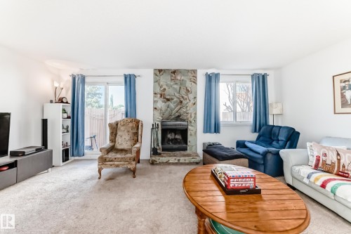 18611 66 Avenue, Edmonton, AB - Indoor Photo Showing Living Room With Fireplace