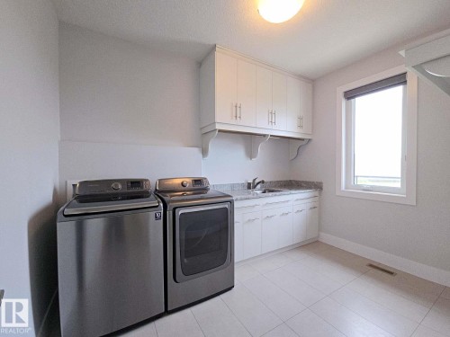 3310 Watson Bay, Edmonton, AB - Indoor Photo Showing Laundry Room