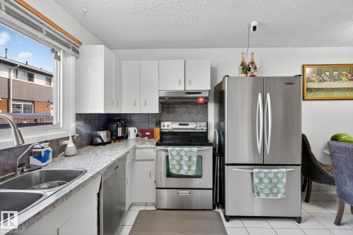 5741 144 Avenue, Edmonton, AB - Indoor Photo Showing Kitchen With Stainless Steel Kitchen With Double Sink