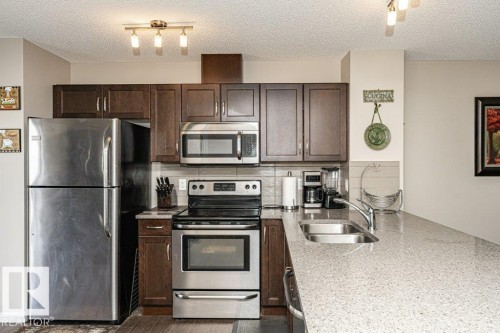 45 7385 Edgemont Way, Edmonton, AB - Indoor Photo Showing Kitchen With Double Sink