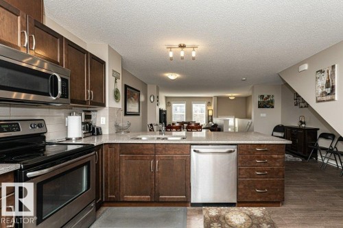 45 7385 Edgemont Way, Edmonton, AB - Indoor Photo Showing Kitchen With Double Sink