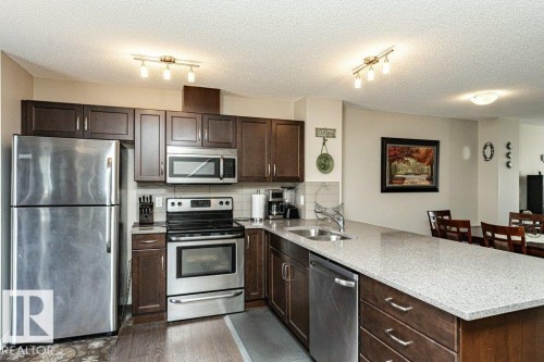 45 7385 Edgemont Way, Edmonton, AB - Indoor Photo Showing Kitchen With Double Sink
