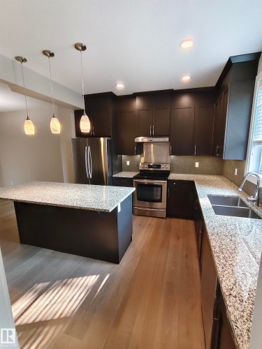 9527 75 Avenue, Edmonton, AB - Indoor Photo Showing Kitchen With Stainless Steel Kitchen With Double Sink With Upgraded Kitchen