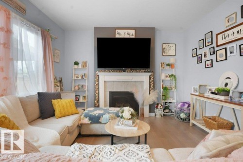 1928 51 Street, Edmonton, AB - Indoor Photo Showing Living Room With Fireplace