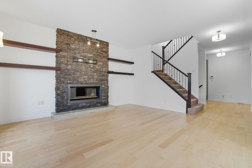 12948 202 Street, Edmonton, AB - Indoor Photo Showing Living Room With Fireplace