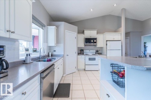 27318 Twp Road 482, Rural Leduc County, AB - Indoor Photo Showing Kitchen With Double Sink
