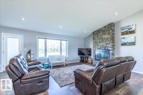 27318 Twp Road 482, Rural Leduc County, AB - Indoor Photo Showing Living Room With Fireplace