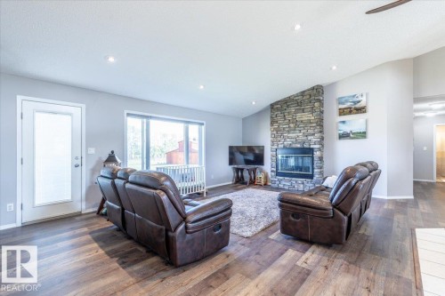 27318 Twp Road 482, Rural Leduc County, AB - Indoor Photo Showing Living Room With Fireplace
