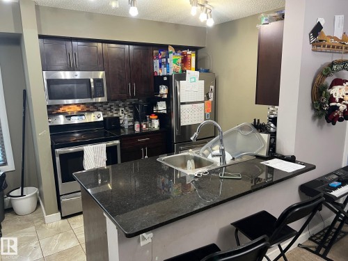 101 107 Watt Common, Edmonton, AB - Indoor Photo Showing Kitchen With Double Sink With Upgraded Kitchen