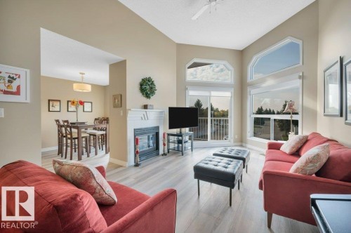 411 65 Gervais Road, St. Albert, AB - Indoor Photo Showing Living Room With Fireplace