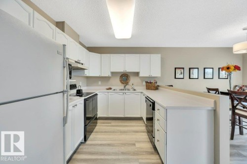 411 65 Gervais Road, St. Albert, AB - Indoor Photo Showing Kitchen With Double Sink