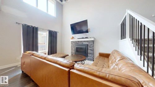 1245 26A Street, Edmonton, AB - Indoor Photo Showing Living Room With Fireplace