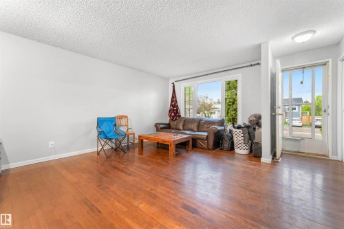 1027 61 Street, Edmonton, AB - Indoor Photo Showing Living Room